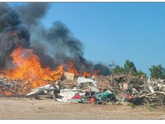 City’s Tornado Debris Goes Up In Flames