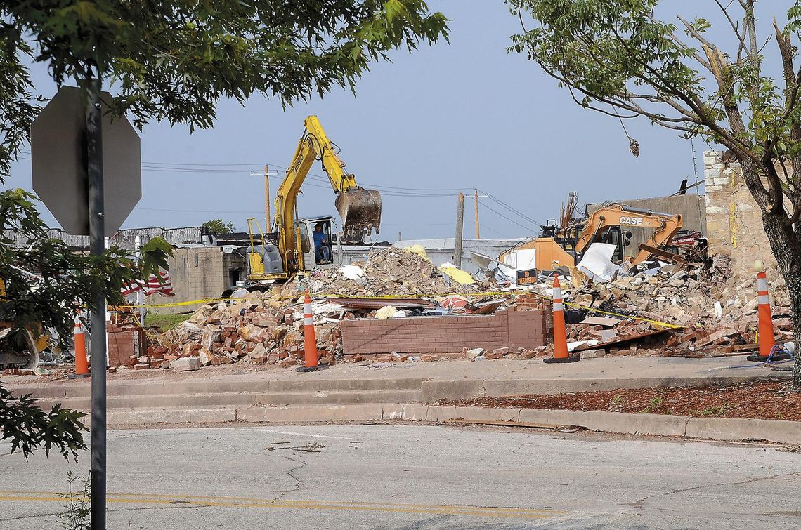 Debris Cleanup Continues In Downtown, Residential Areas